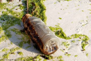 This oil-covered bottle washed up on a Gulf Coast beach after the 2010 Deepwater Horizon tragedy.  Photo by Andy Brack