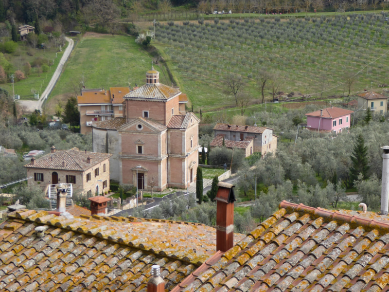 A view of a villa in the Tuscan hills.