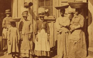 From a stereoscopic image of oyster and fish women in Charleston from 1870 by photographer B.W. Kilburn. Photo is part of The New York Public Library Digital Collections.