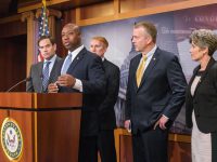 U.S. Sen. Tim Scott, at podium, discusses formation of the Senate Opportunity Caucus at a Capitol Hill press conference in September.