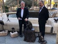 Rotarians Dan Ravenel and John Tecklenburg, both past presidents of the club, with wildlife statuary at the Rotary Fountain.