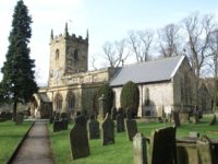 The church in Eyam, Derbyshire, England, which was closed during the plague to keep people from being too close.  Photo via Wikipedia.
