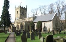 The church in Eyam, Derbyshire, England, which was closed during the plague to keep people from being too close.  Photo via Wikipedia.